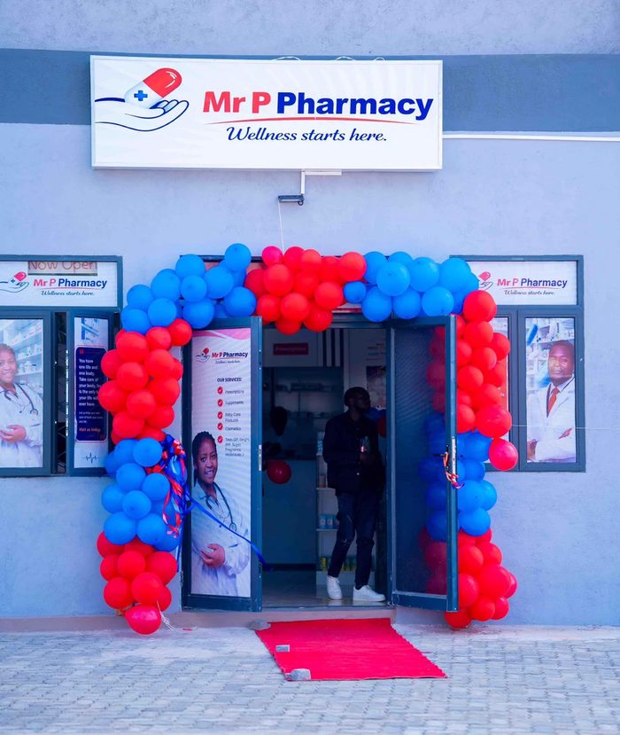 Mr P Pharmacy storefront, opposite Kandodo Cornershop, Blantyre